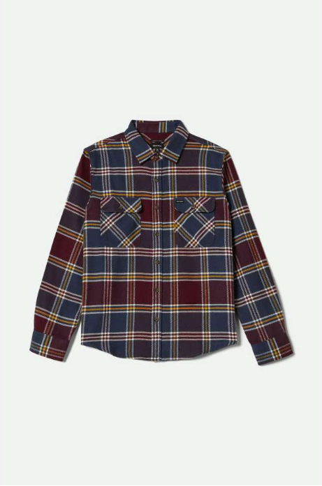 Plaid shirt with a pattern of red, blue, and yellow on a white background