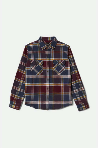 Plaid shirt with a pattern of red, blue, and yellow on a white background