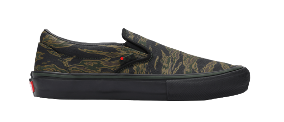 Black slip-on sneaker with camouflage pattern on a white background
