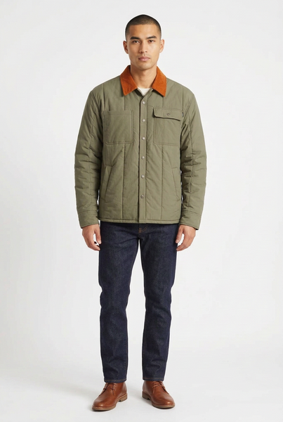 An olive green quilted utility jacket with a contrasting orange corduroy collar and bright orange interior lining, shown against a light gray background.