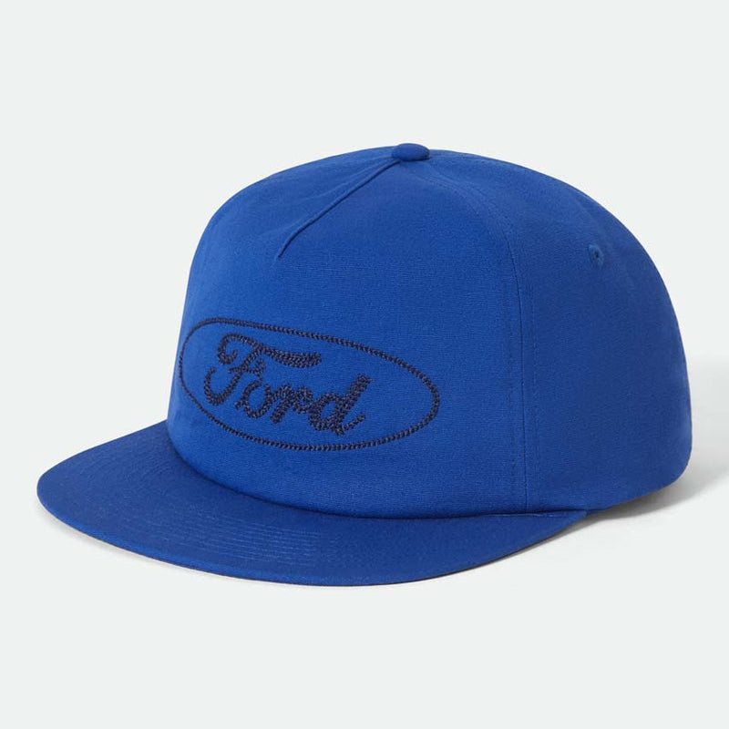 Blue cap with Ford logo on a light gray background