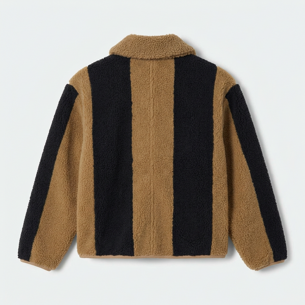 A cropped sherpa fleece jacket with a color-blocked design in tan and black, featuring a button-up front, a collar, and two front patch pockets, shown on a light gray background.