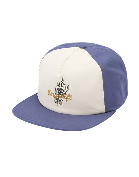 Two-tone purple and white cap with a logo on a light gray background